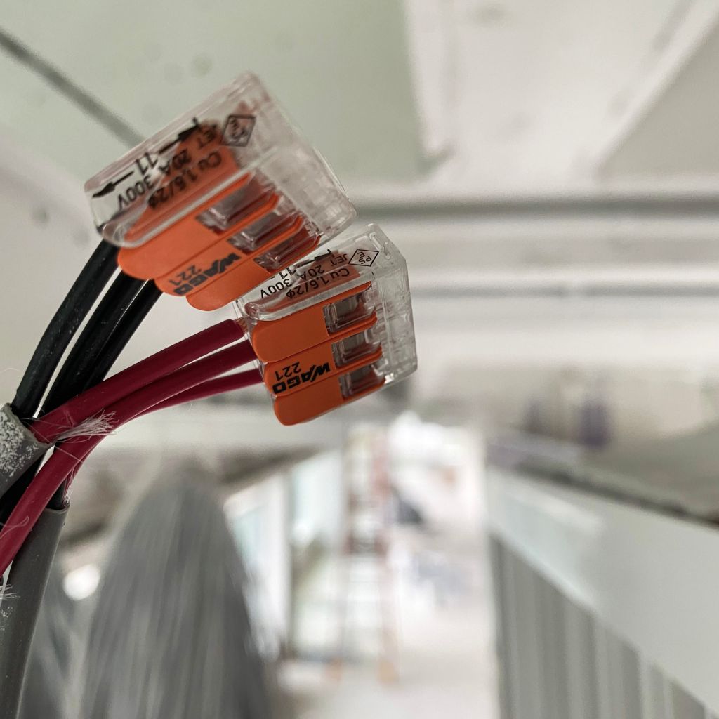 Engineers splicing high capacity fiber cables